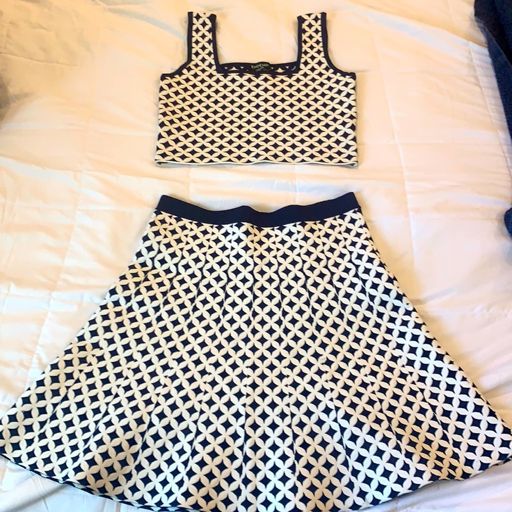 BEBE two piece outfit. Skirt and crop top. Great quality  Material. Size medium